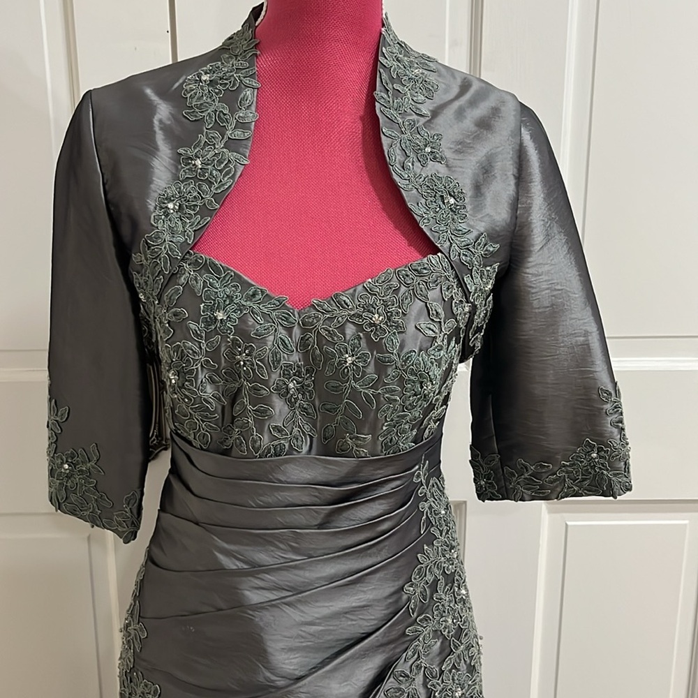 Elegant Gray Strapless Evening Gown with bolero jacket.